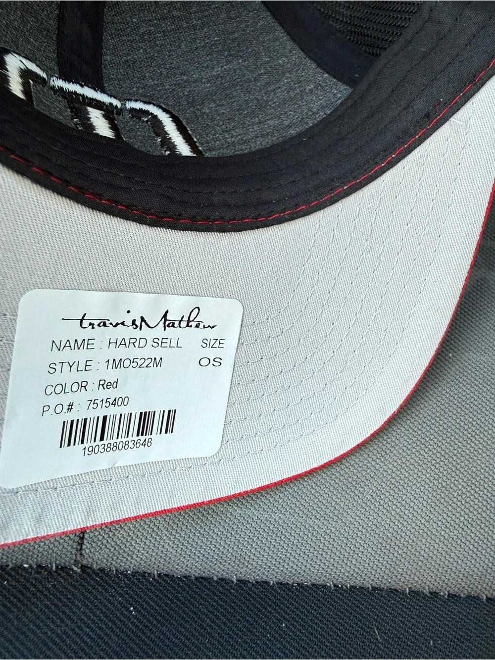 Travis Mathew Red and Black Curved Brim Hat